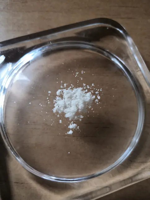 MEGA bookmark of mephedrone on an ashtray.webp